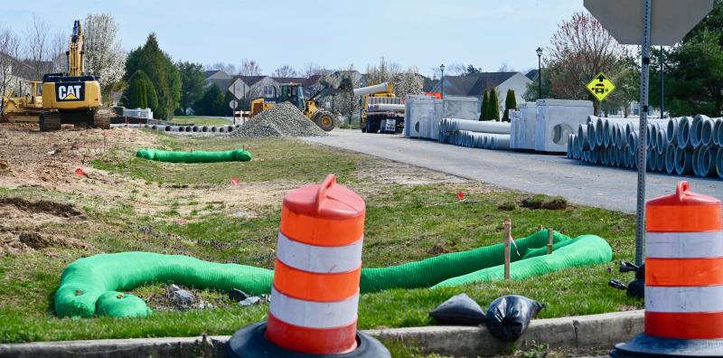 Salt Marsh Boulevard, a road in the Henlopen Landing community, has become a staging area for the new Plantation Road roundabout project near Lewes. RON MACARTHUR PHOTO